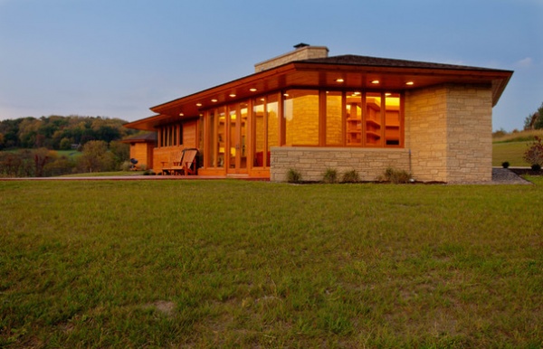 Midcentury Exterior by Genesis Architecture, LLC.