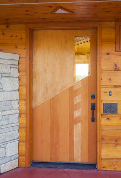 Midcentury Entry by Genesis Architecture, LLC.