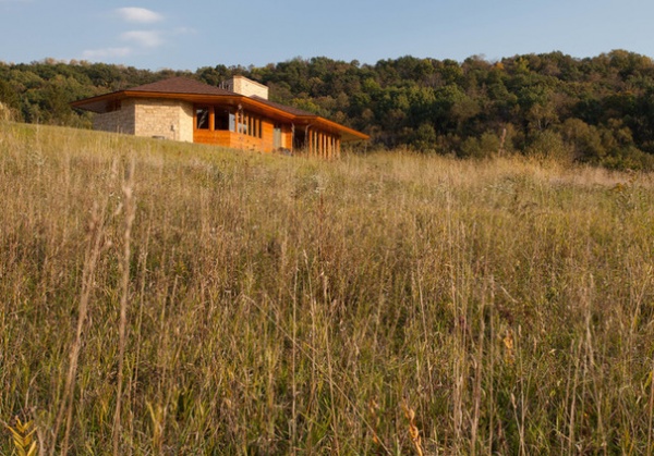 Midcentury Exterior by Genesis Architecture, LLC.