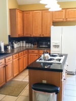 Gray Cabinets Update a Texas Kitchen