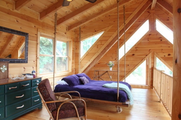 Rustic Bedroom by Log Homes of America