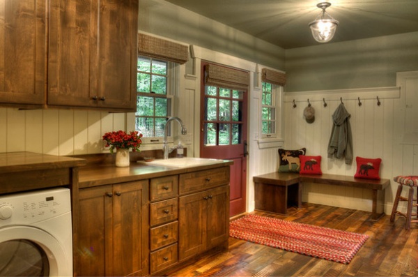 Rustic Laundry Room by Lands End Development - Designers & Builders