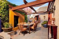 Patio Details: Sliding Fabric Panels Filter the Light Just Right