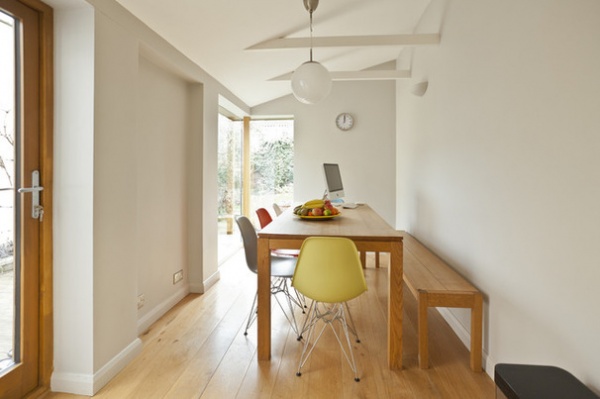 Midcentury Dining Room by DHV Architects