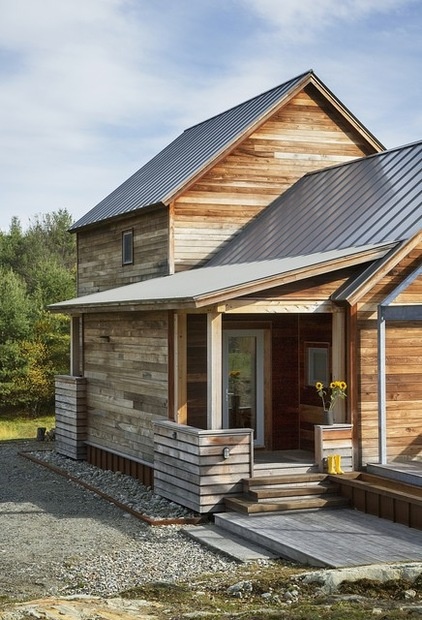 Farmhouse Exterior by ZeroEnergy Design