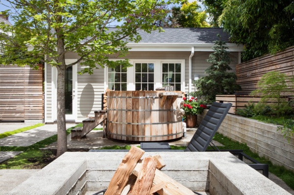 Rustic Patio by Howells Architecture + Design, LLC