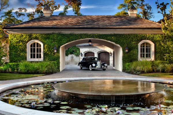 Traditional Garage And Shed by JAUREGUI Architecture Interiors Construction