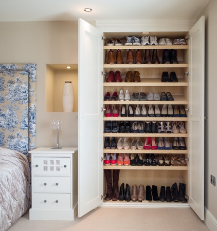 Transitional Closet by Acastrian Bespoke Fitted Furniture