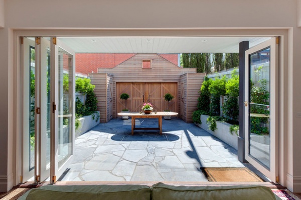 Rustic Patio by Whetstone Windows & Doors