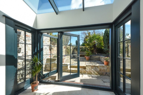 Rustic Sunroom by MillChris Developments Ltd