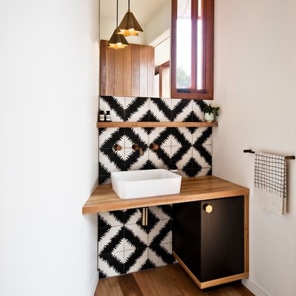 Contemporary Powder Room by Auhaus Architecture