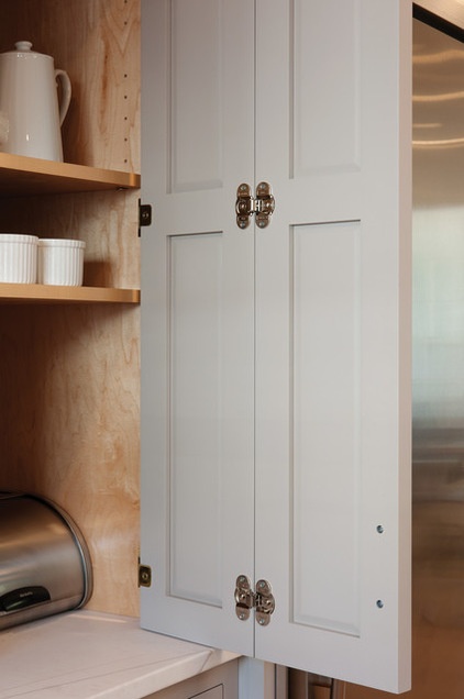 Farmhouse Kitchen by Crown Point Cabinetry