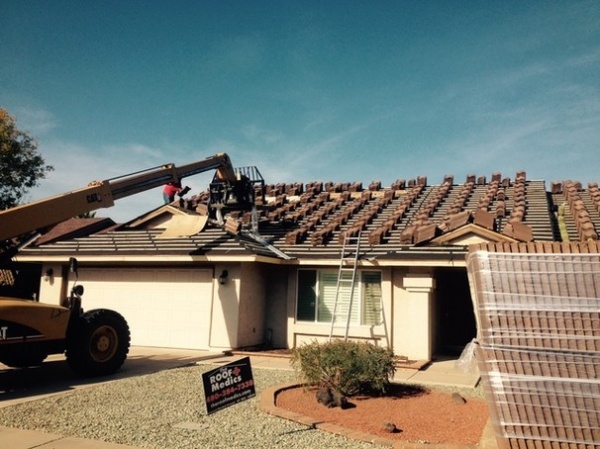 Traditional Exterior by The Roof Medics