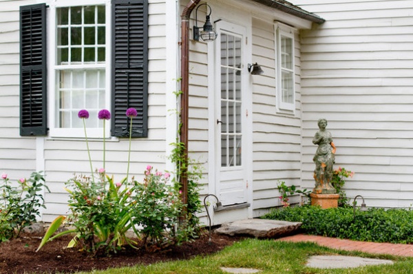 Farmhouse Exterior by Rikki Snyder