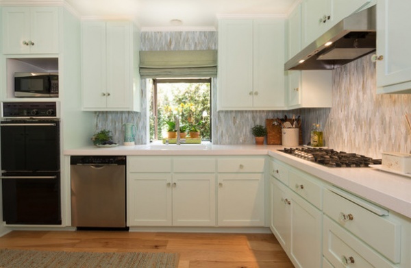 Beach Style Kitchen by Charmean Neithart Interiors, LLC.