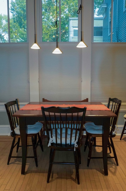 Traditional Dining Room by The Phoenix Photography