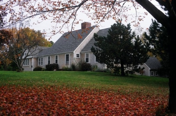 Traditional Exterior by SAVOIE Architecture